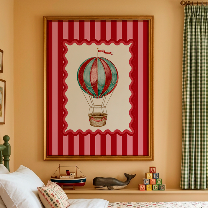 A styled children's bedroom featuring a large framed art print of a vintage hot air balloon with red and white stripes, hung on a warm yellow wall above a bed with white linens and a quilted cover.